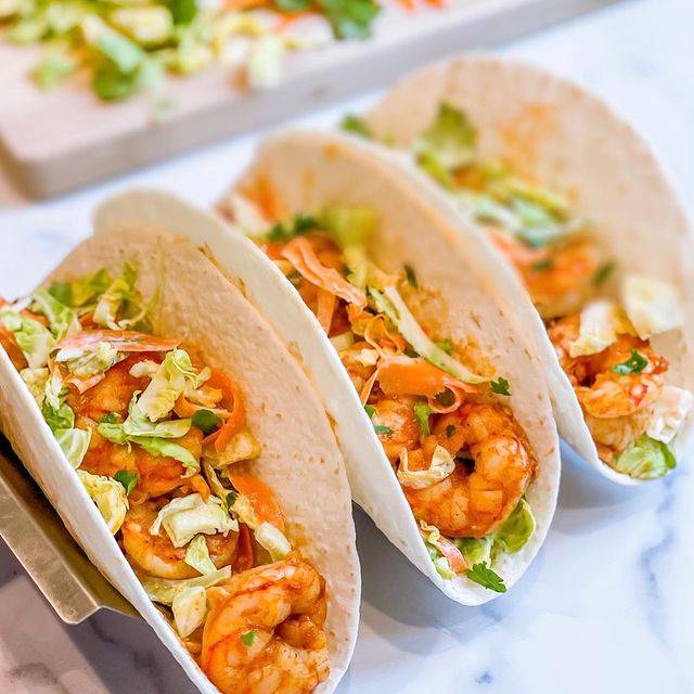 Three prepared shrimp tacos