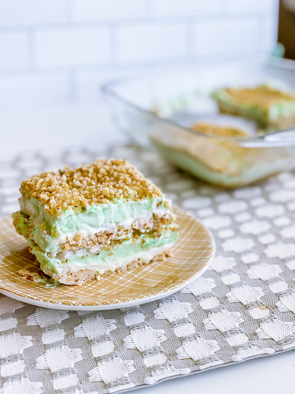 Pistachio dessert served on a plate.
